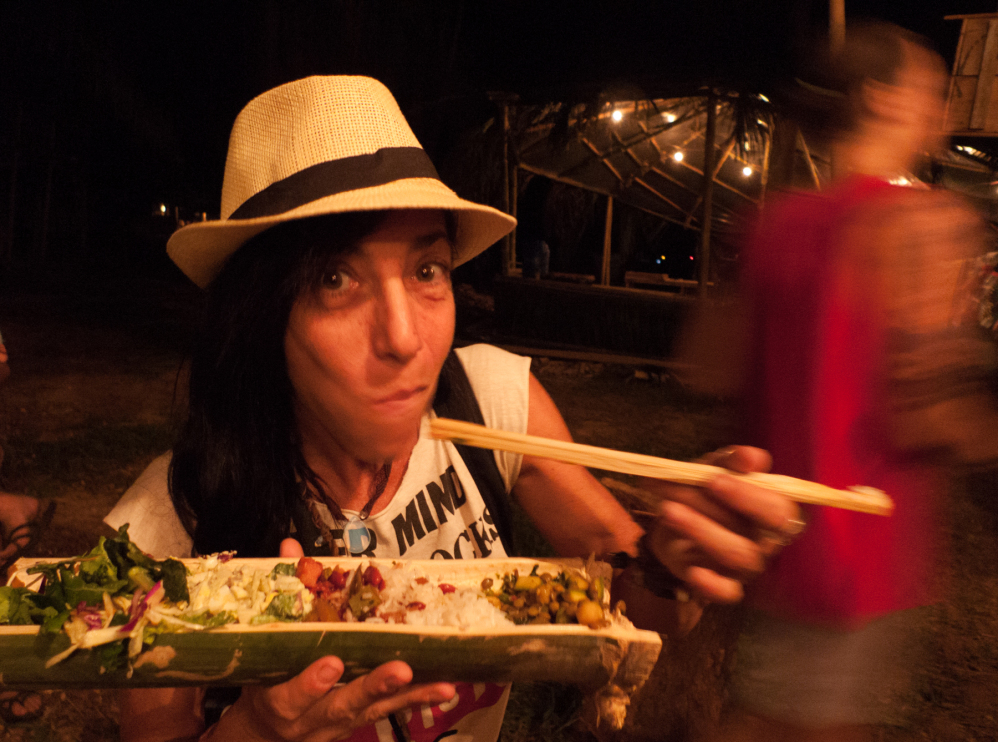 eating out of a bamboo trough at envision festival