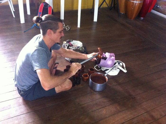 Cups of chocolate being poured for a Cacao Ceremony.