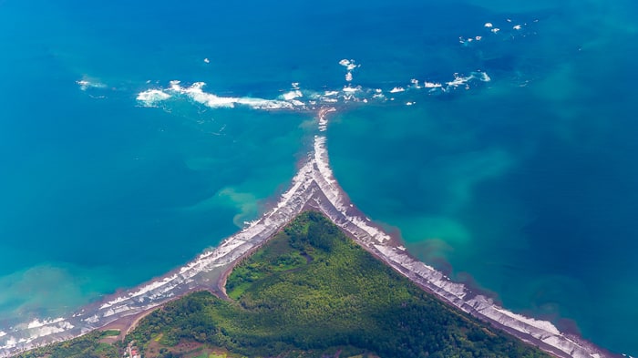 Airplane view of Ballena Marine National Park with its distinctive “whale tail” landmark.