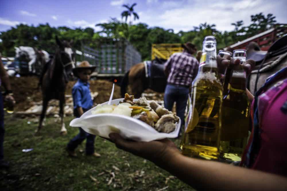 Caribbean food vendors serving traditional dishes at the Rasta Tope celebration