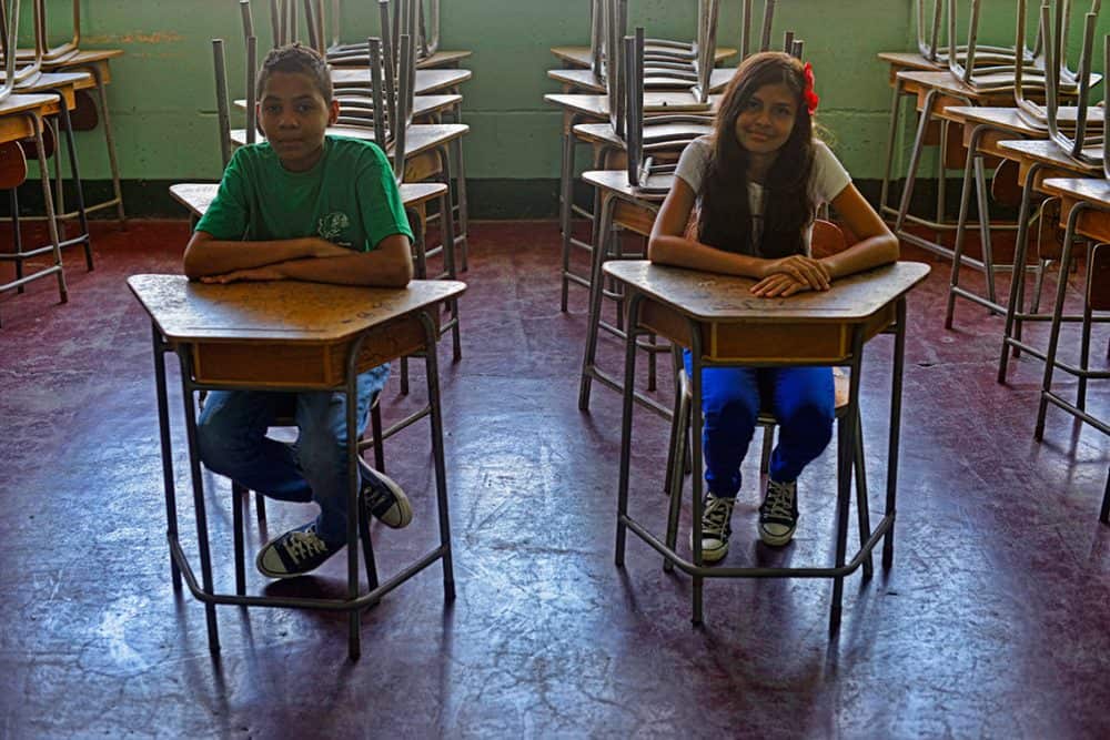 Children from Barrio Limoncito working on a science project about manatee conservation