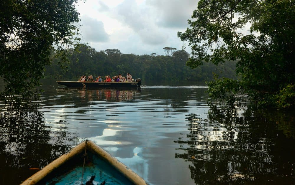 A boat full of tourists in Costa Rica's Tortuguero National Park.