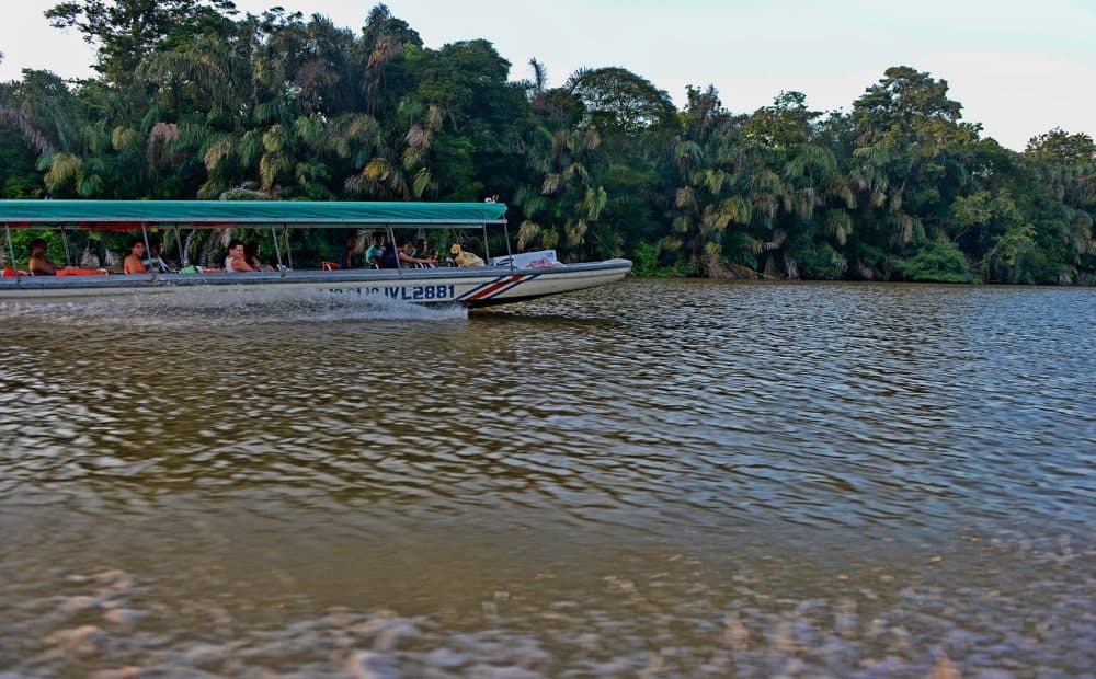 A boat carrying tourists in Costa Rica's Tortuguero National Park.