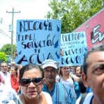 Protesters at the Nicoya annexation anniversary demand a solution for the water crisis in the Guanacaste province. Water in some regions had been contaminated with arsenic, and the province is also in the midst of a drought, July 25, 2014.