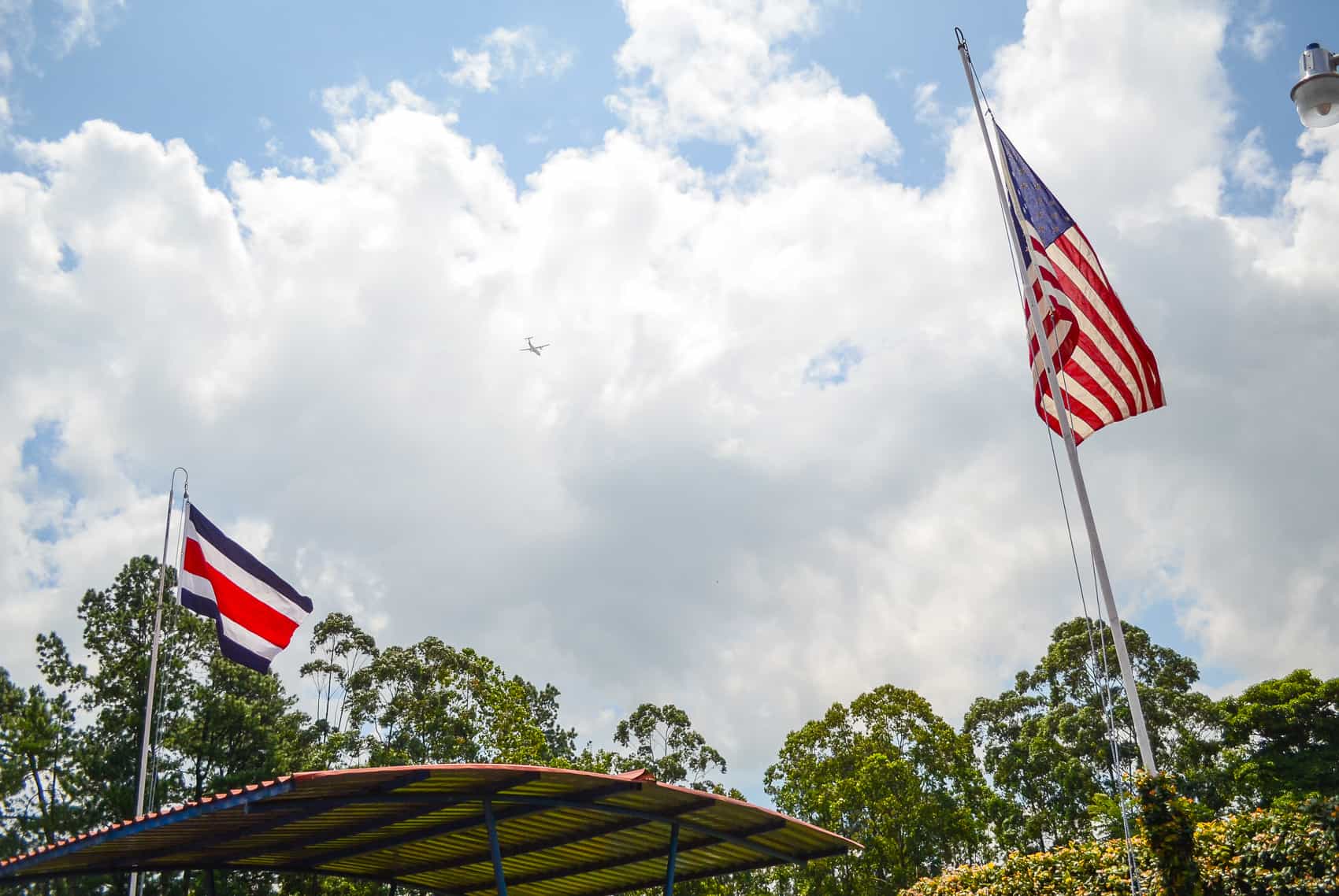 The Costa Rican and U.S. flags flying side-by-side.