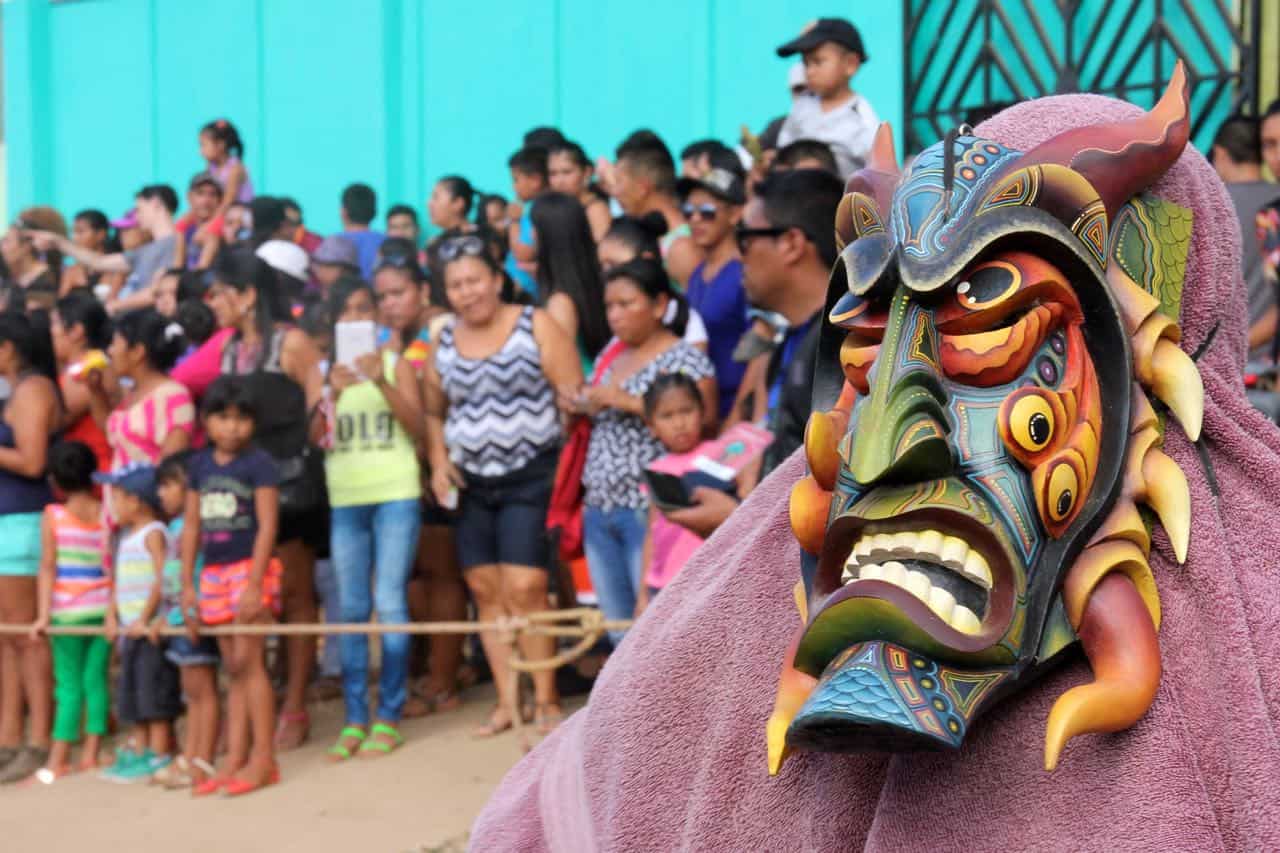 Person wearing Brunca mask and crowd