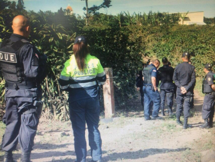 Costa Rican police search the area near where Ryan Piercy's abandoned car was found.