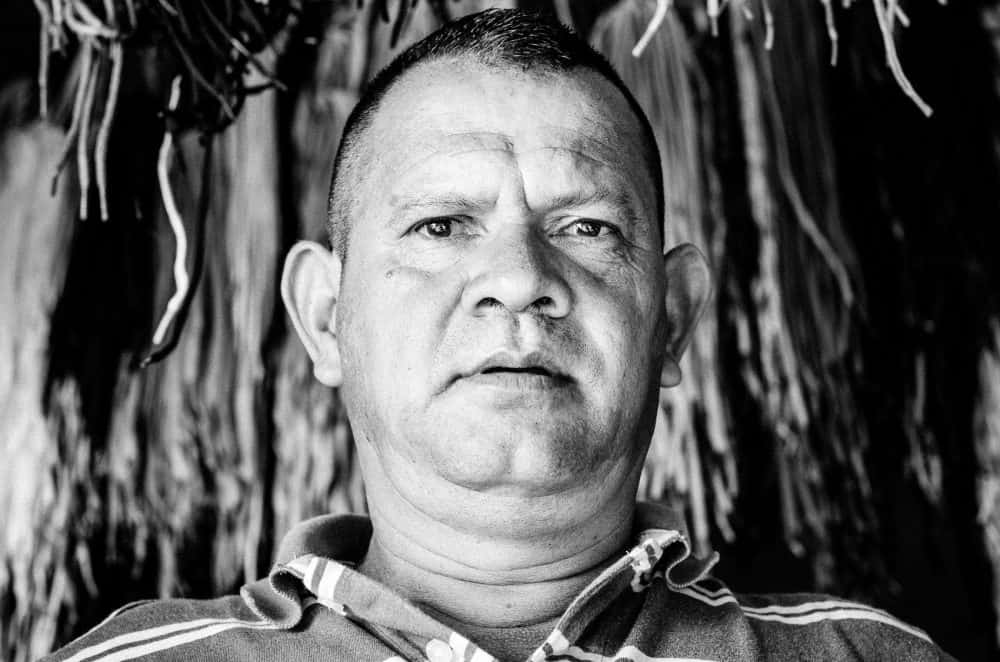 Worker at Costa Rica's Barrio Amón Historic Shoe Repair Shop 