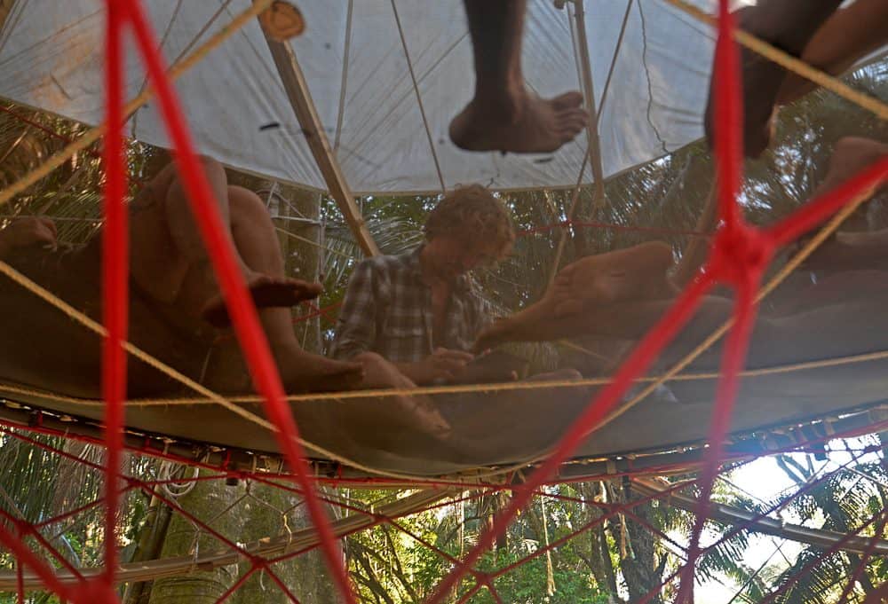 Costa Rica Envision Festivalgoers chill out on a suspended trampoline in the Envision village.