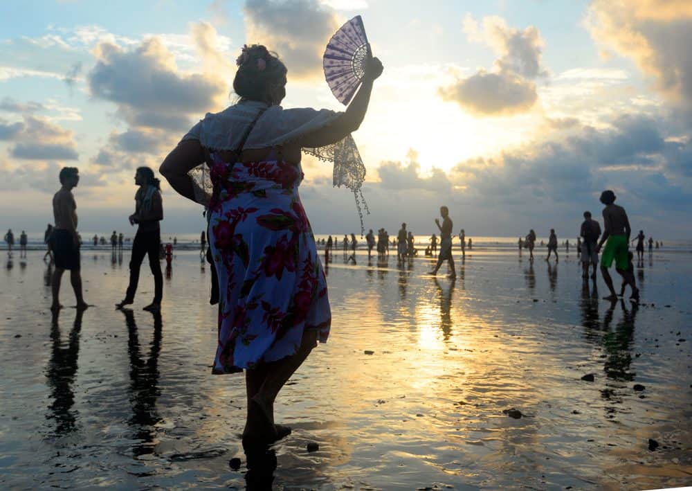 Dancing on the beach at sunset during Envision Festival in Costa Rica