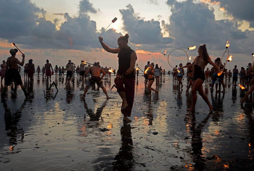 Fire dancers in Costa Rica overtook the beach during the Envision festival's last sunset ceremony 