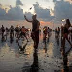 Fire dancers overtook the beach during the festival's last sunset ceremony on Sunday.