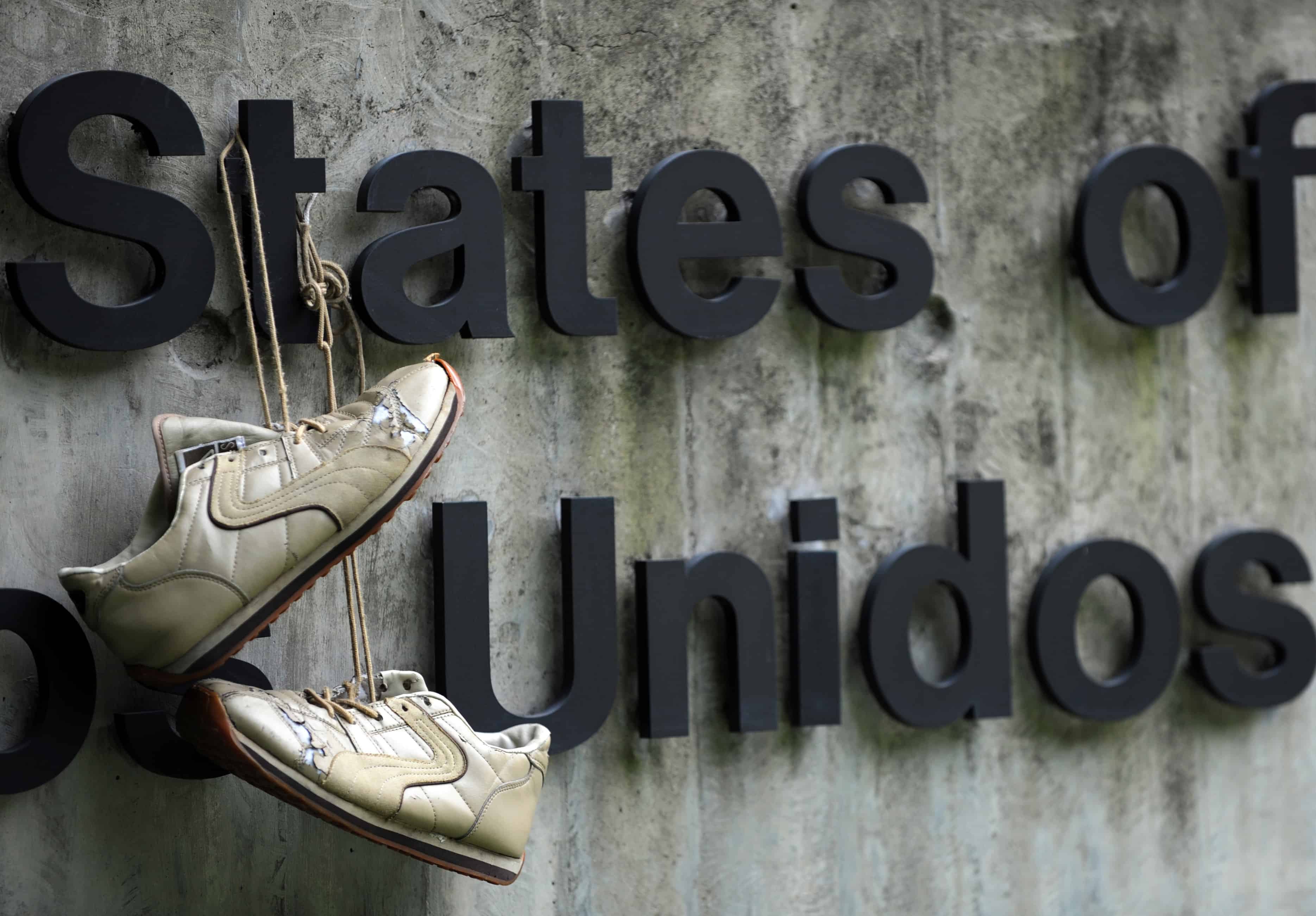 A pair of shoes hang at the U.S. Embassy in Caracas in 2008.