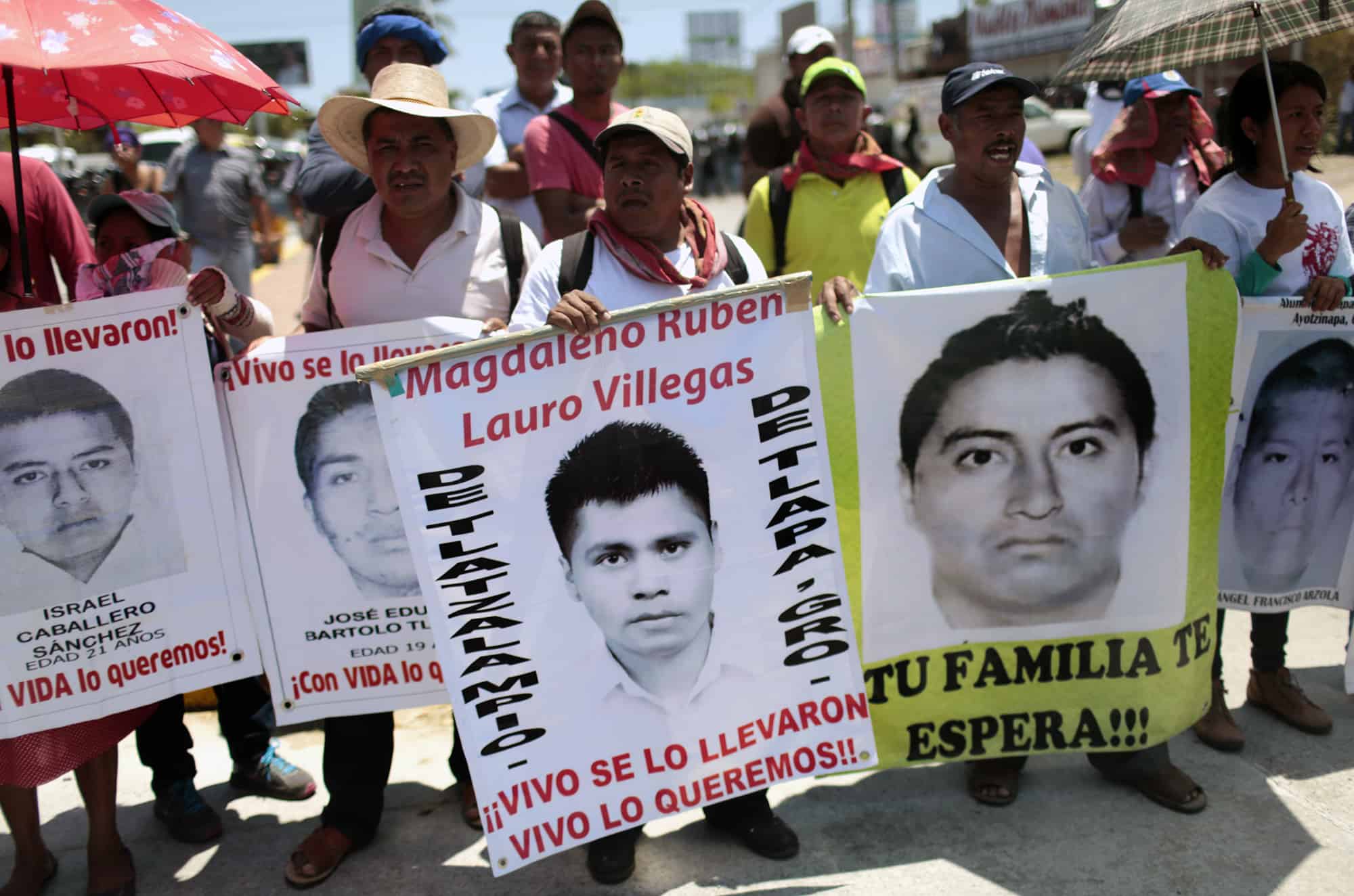 Parents and relatives of the 43 students from Ayotzinapa participate in a protest in Acapulco, Guerrero State, Mexico on March 24, 2015 demanding justice on their disappearance and on the death of teacher Claudio Castillo killed during a protest on February 24.
