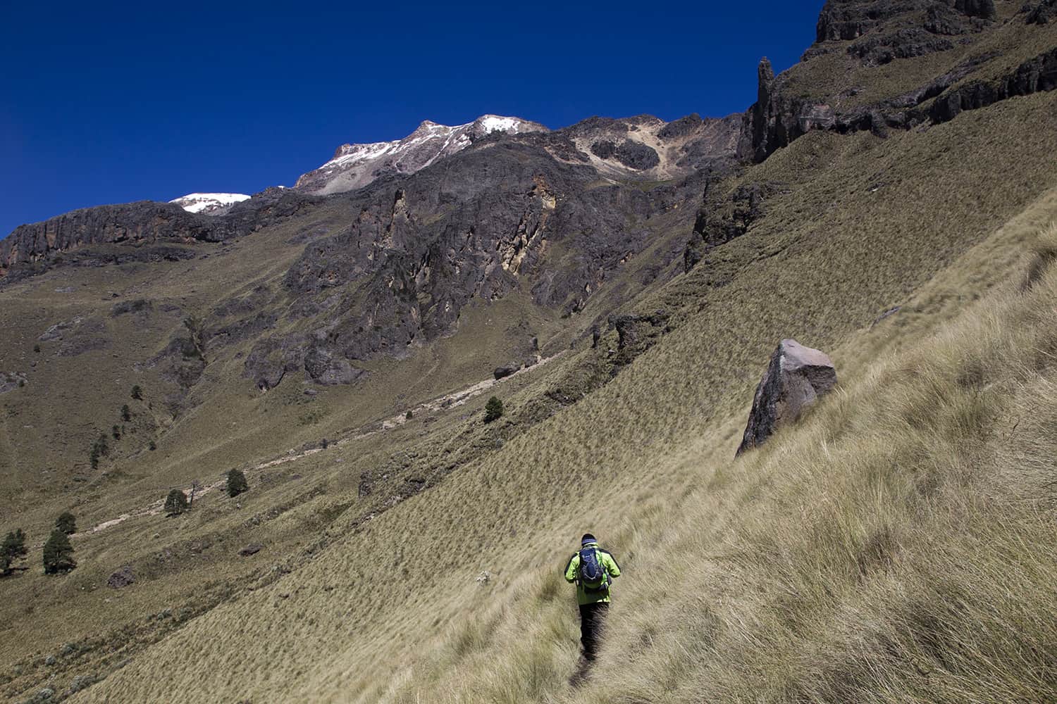 A guard walks along the slopes of IztaccÌhuatl mountain in the Izta-Popo National Park, Mexico on October 29, 2014. The graciars that crown IztaccÌhuatl are considered by experts as doomed to disappear in 10 years due to global warming.