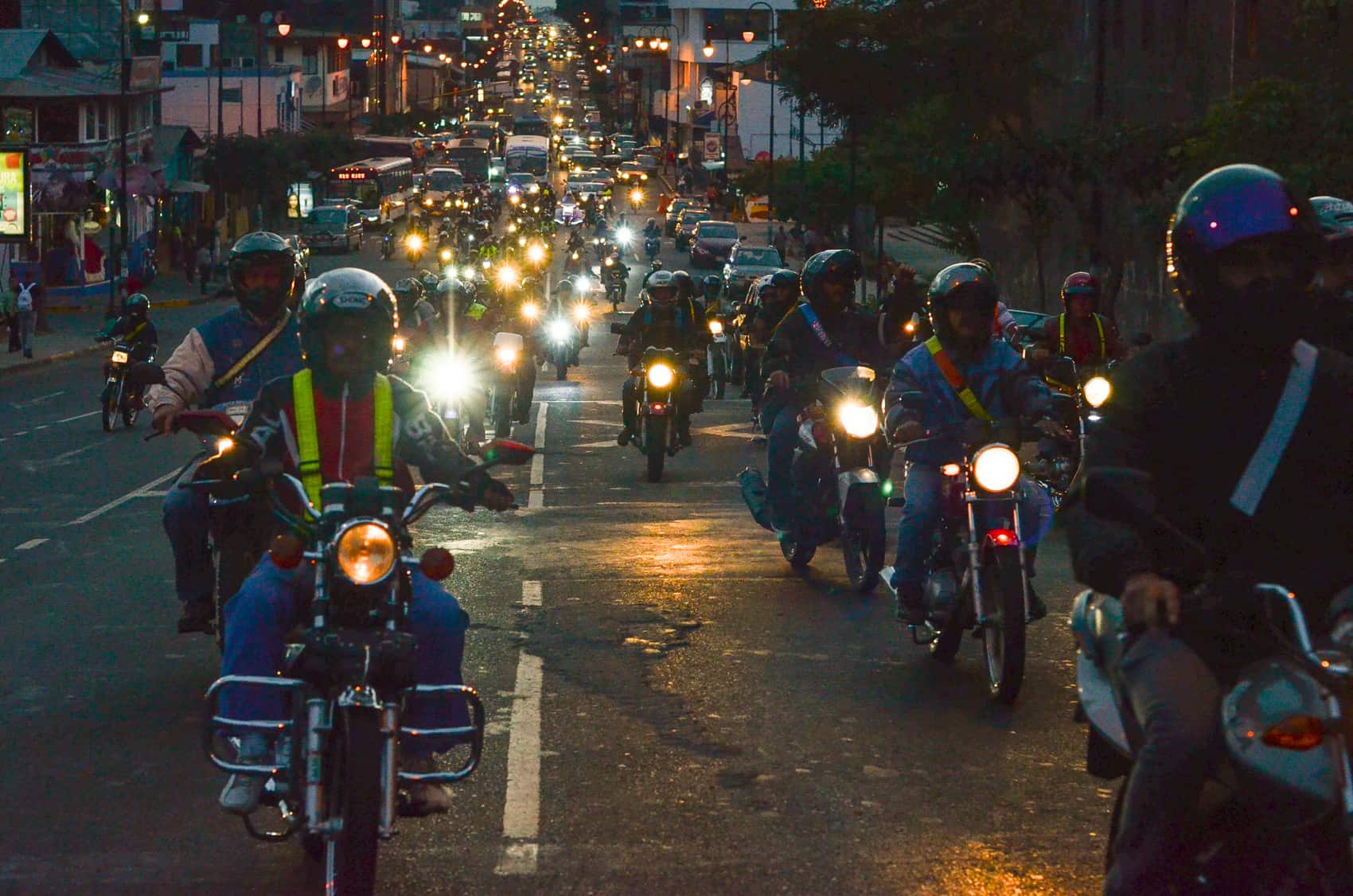 Dozens of motorcyclists gathered Wednesday in front of the National Insurance Institute (INS) in Barrio Amón and rode from there to the Legislative Assembly to protest proposed regulations prohibiting more than one person on a bike.