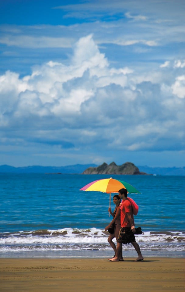 On the beach with a parasol