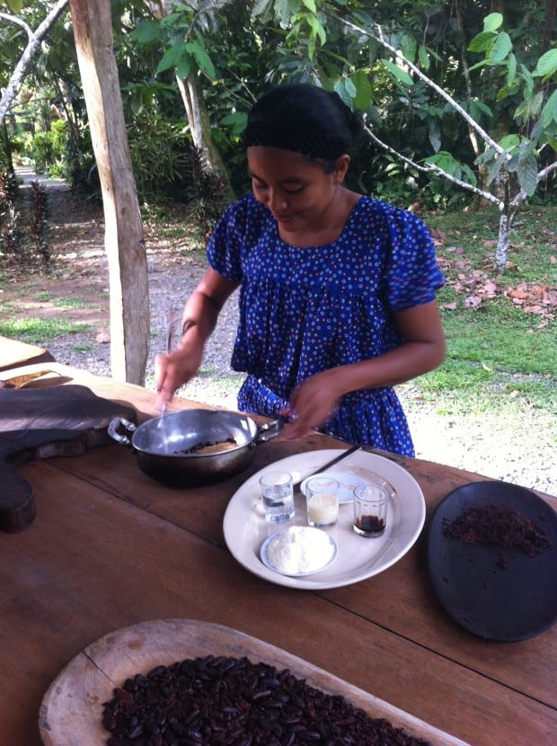 Eunice, an indigenous Teribe, whips up some chocolate during a tour of the Museo de Cacao in Cahuita, Costa Rica.
