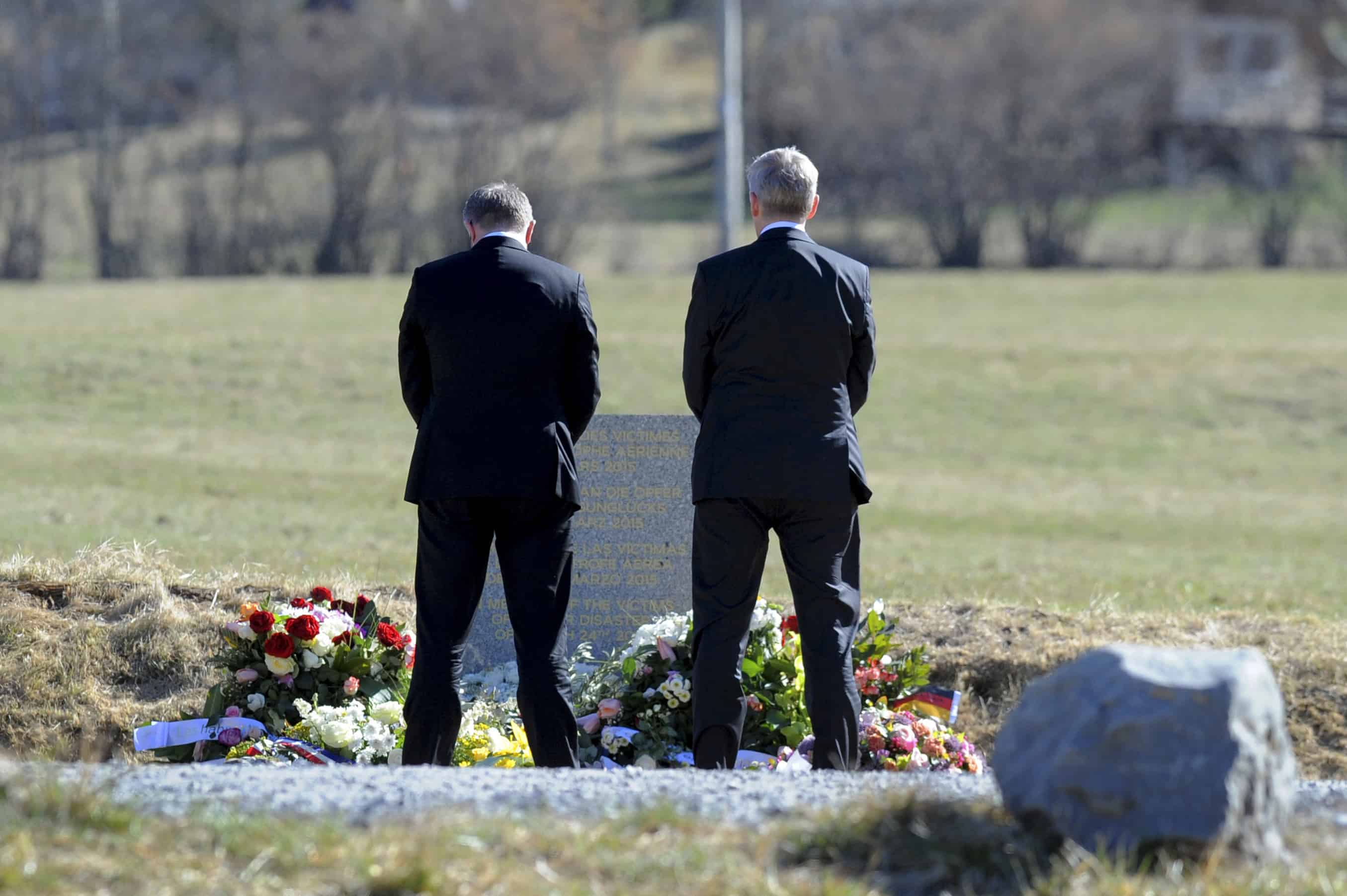 Lufthansa CEO Carsten Spohr, left, and Germanwings CEO Thomas Winkelmann lay a wreath near a stele in memory of the victims of the Germanwings Airbus A320 crash.