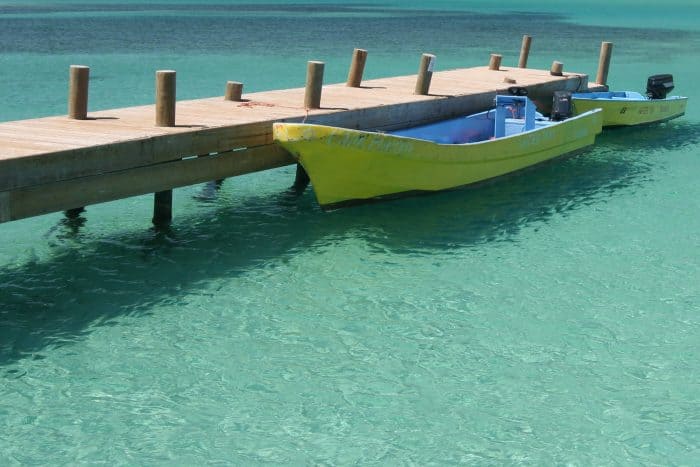 A boat docked in the bay at Roatán, Honduras.