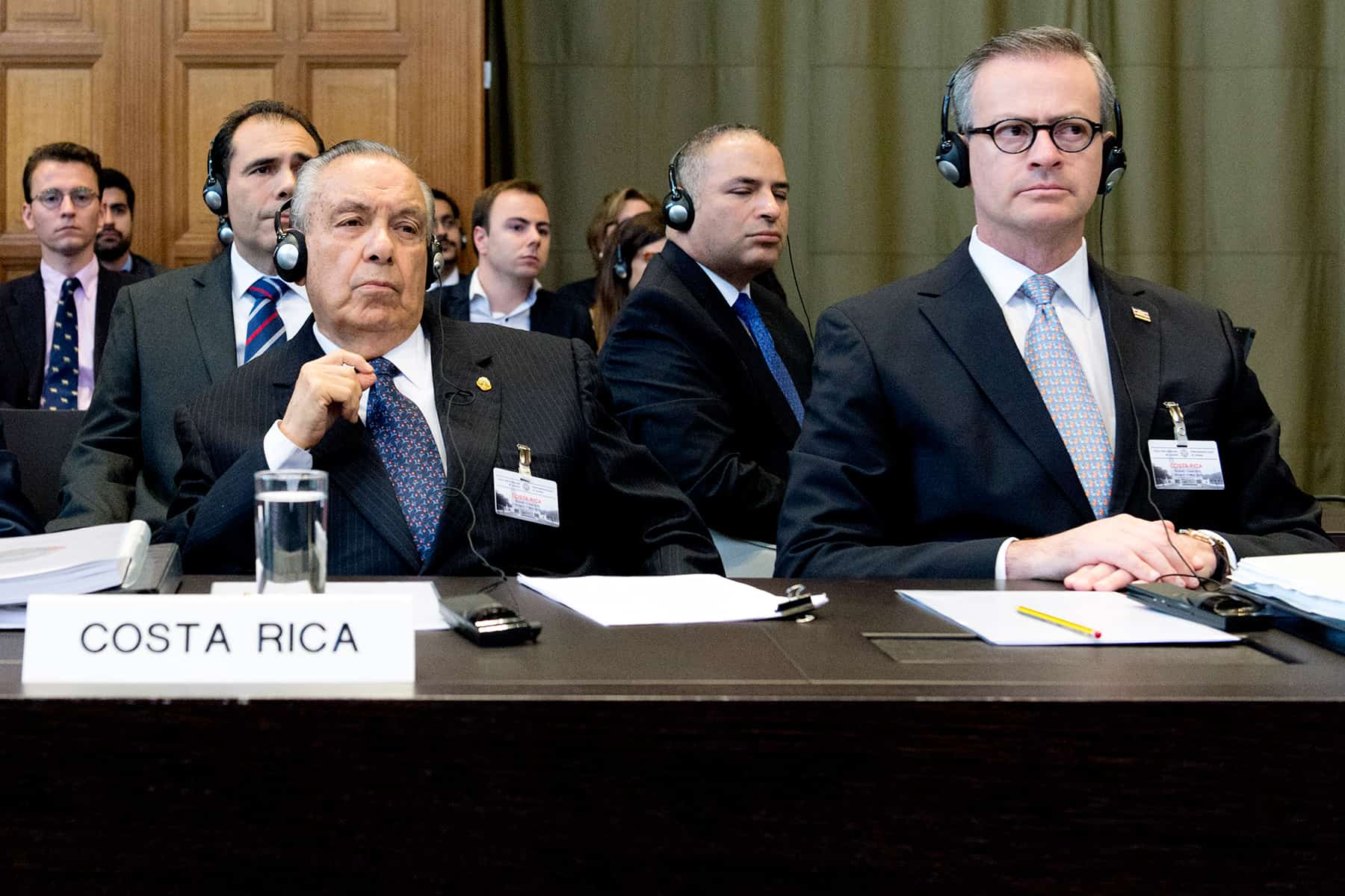 Costa Rica's representative before The Hague, Édgar Ugalde Álvarez (L), and Foreign Minister Manuel González Sánz (R) attend oral hearings at the International Court of Justice, April 21, 2015.