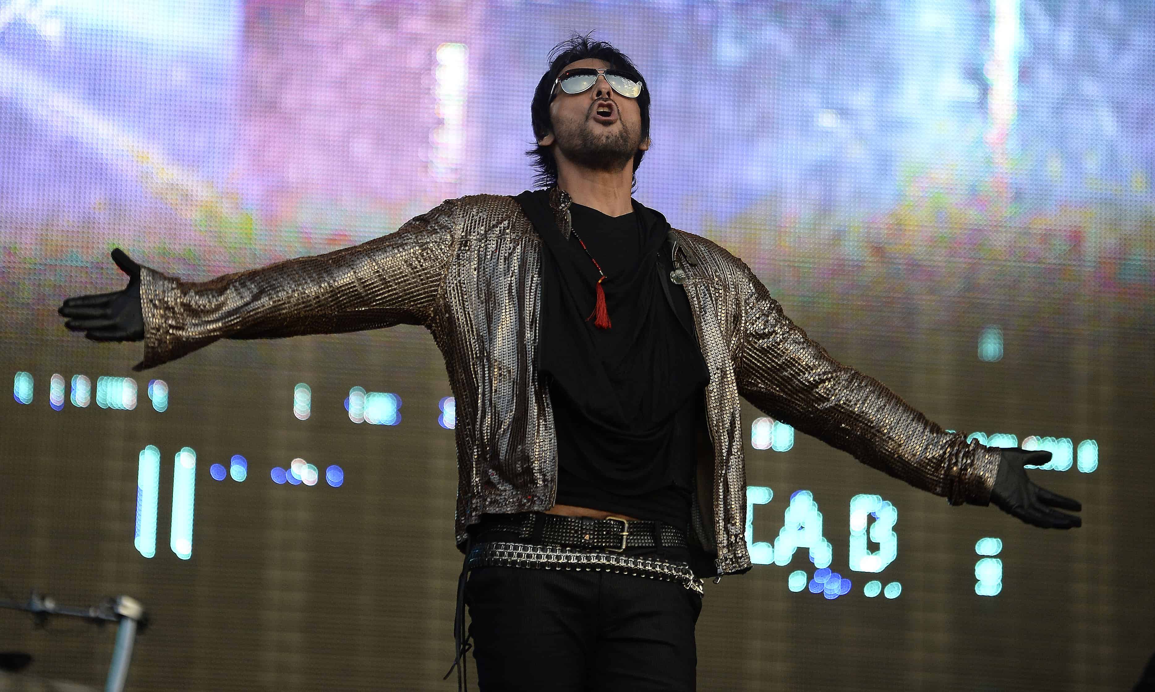Beto Cuevas of Chilean rock band La Ley performs during the fourth day of the Vive Latino music festival at the Foro Sol in Mexico City, on March 30, 2014.