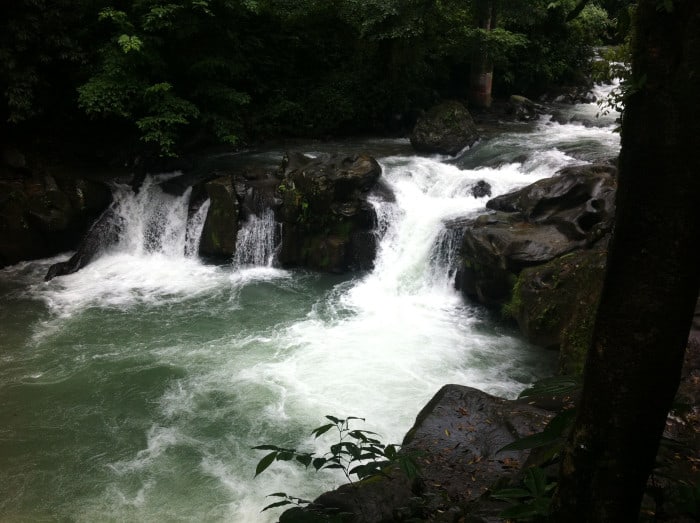 Waterfall and swimming hole by Costa Rica's La Fortuna Bridge.