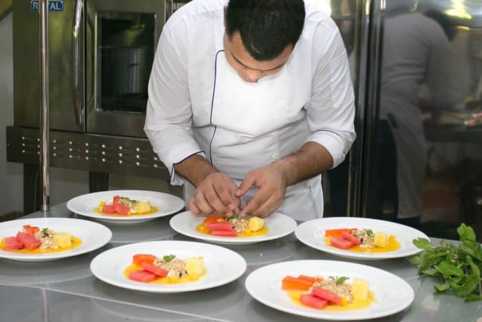 Chef prepares dishes at Playa Cativo Lodge Costa Rica