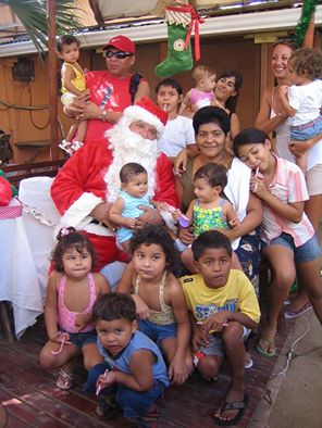 Barry Lawson playing Santa Claus in Tamarindo.