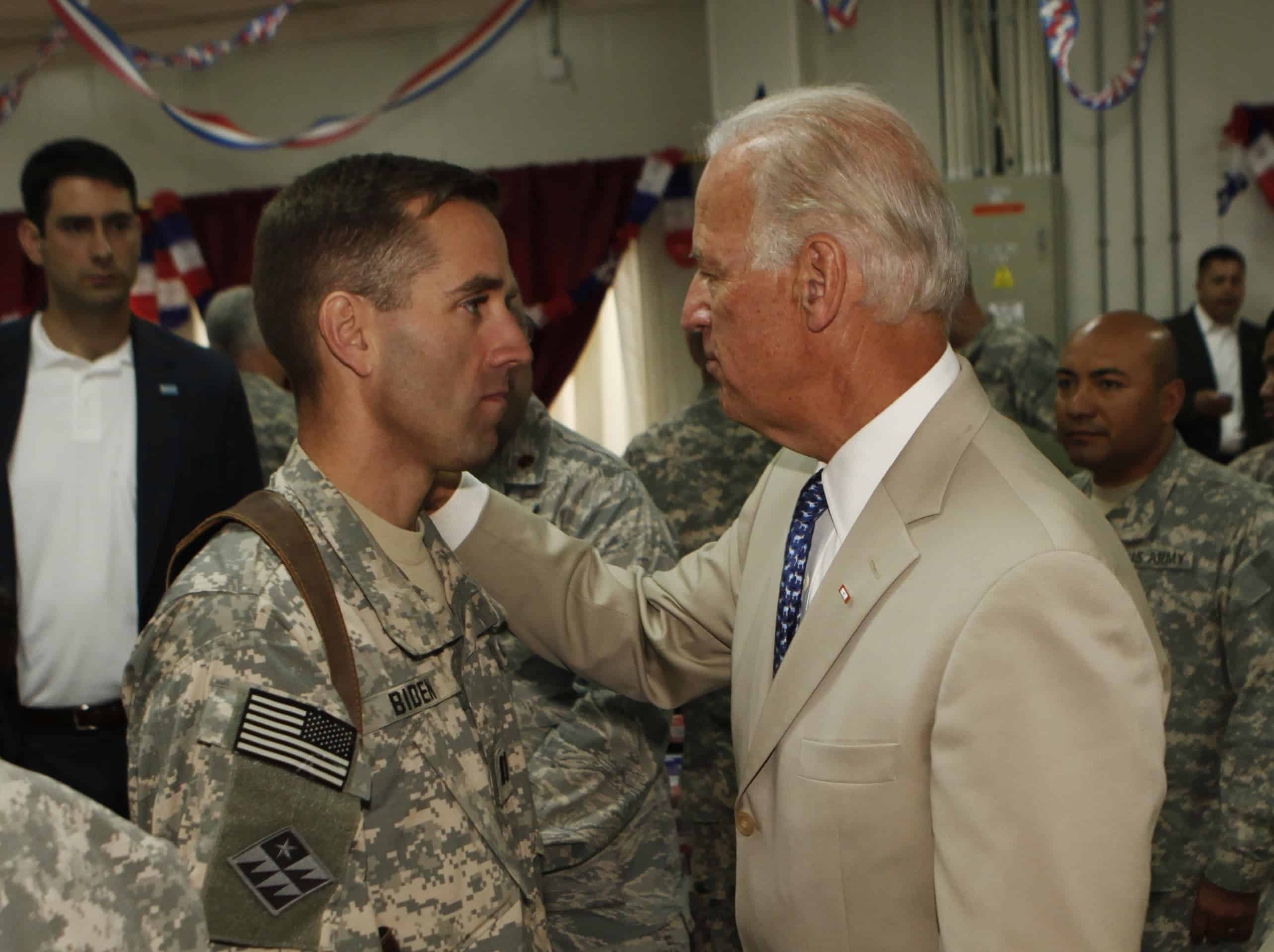 U.S. Vice President Joe Biden talks with his son Beau in 2009