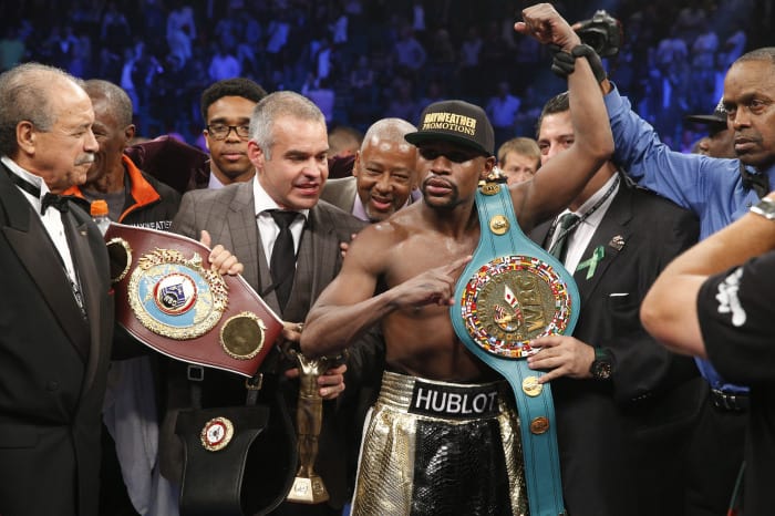 Floyd Mayweather Jr. celebrates after defeating Manny Pacquiao. 