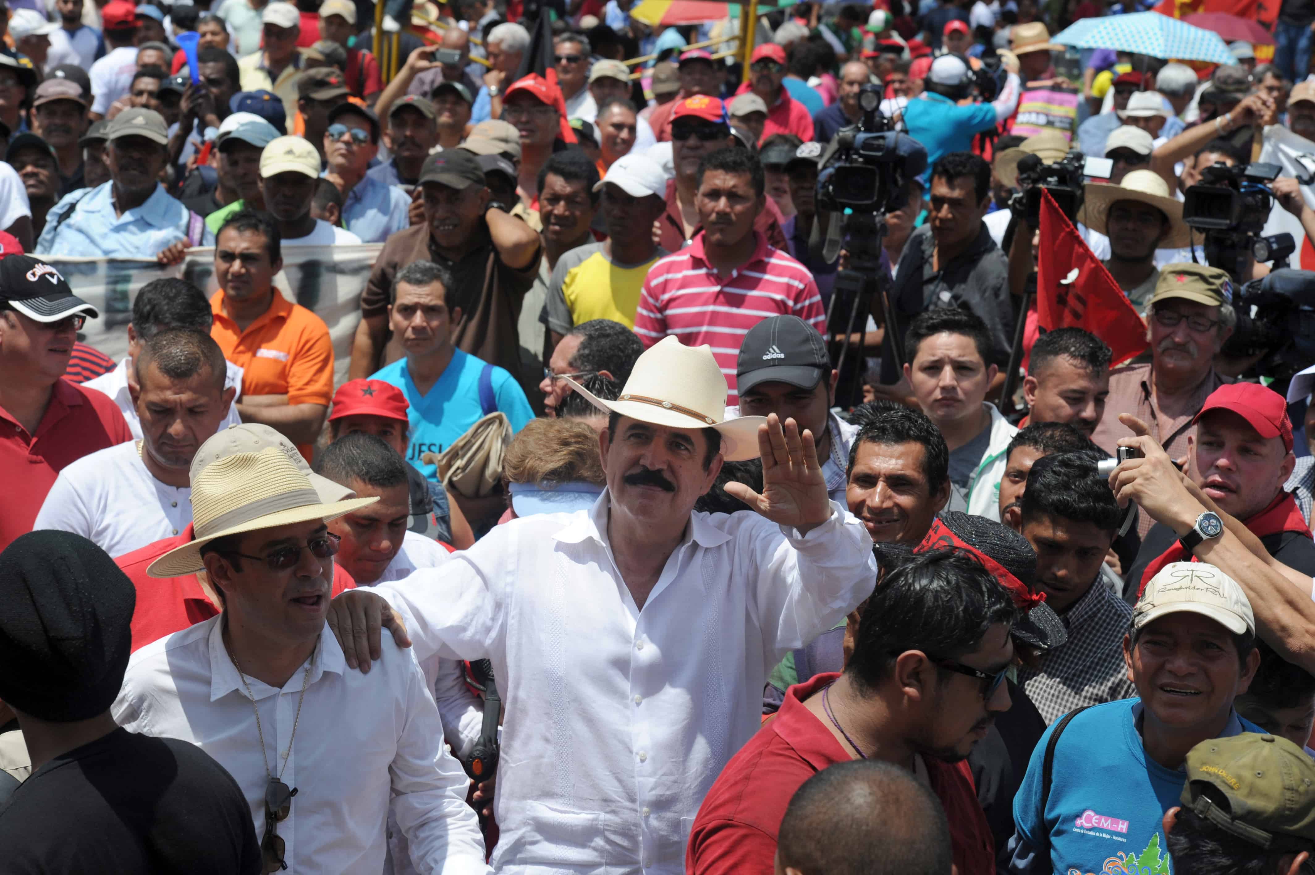 Former Honduran President Manuel Zelaya (center) participates in the May Day march in Tegucigalpa on May 1, 2015.