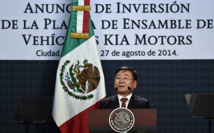 The vice president of global strategy at Kia Motors, Hyung-Kun Lee, delivers a speech during an announcement in Mexico City.