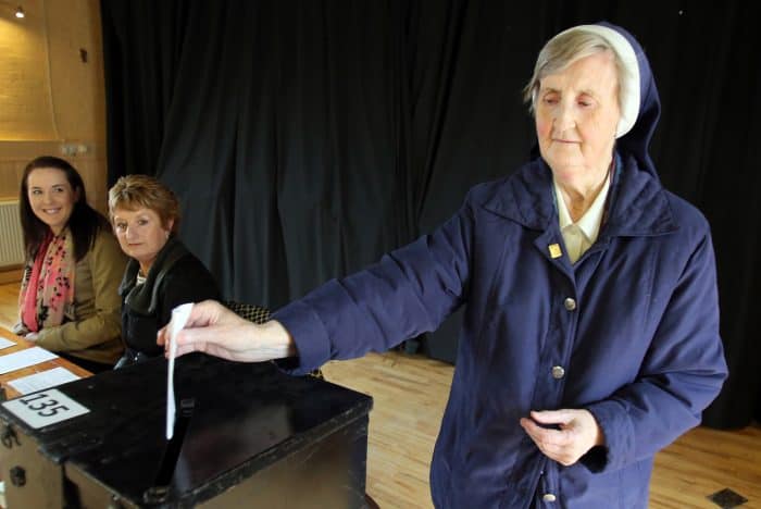 Sister Loreto Ryan of the Sisters of Charity casts her vote at a polling station in Drumcondra, north Dublin.