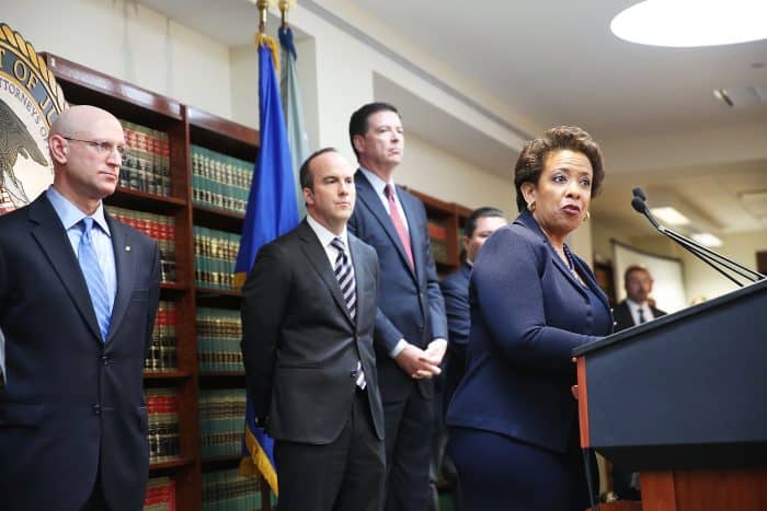 Attorney General Loretta Lynch speaks at a packed news conference.