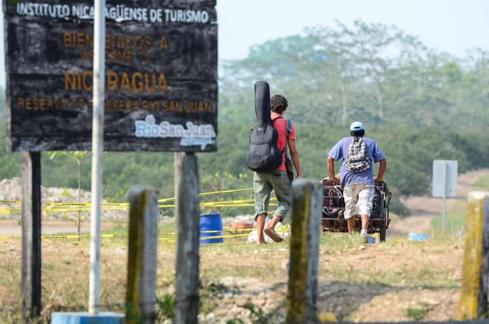 A Nicaraguan migrant heads back after being denied entry to Costa Rica, 