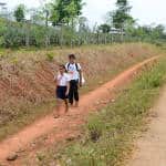 Nicaraguan school kids walk along Route 1856 in northern Alajuela province, April 29, 2015.