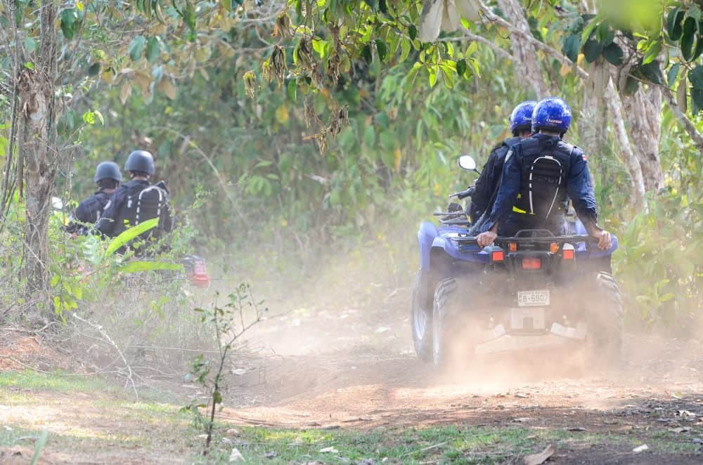 Costa Rican police patrol the border with Nicaragua on ATVs near Las Tablillas,