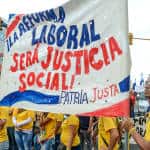 Workers from the Costa Rican Electricity Institute (ICE) support labor reform at the May 1 march.
