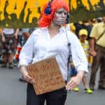 A protester criticizes working conditions at some call centers in Costa Rica.