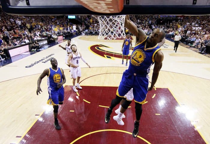 Andre Iguodala (#9) of the Golden State Warriors dunks against the Cleveland Cavaliers.