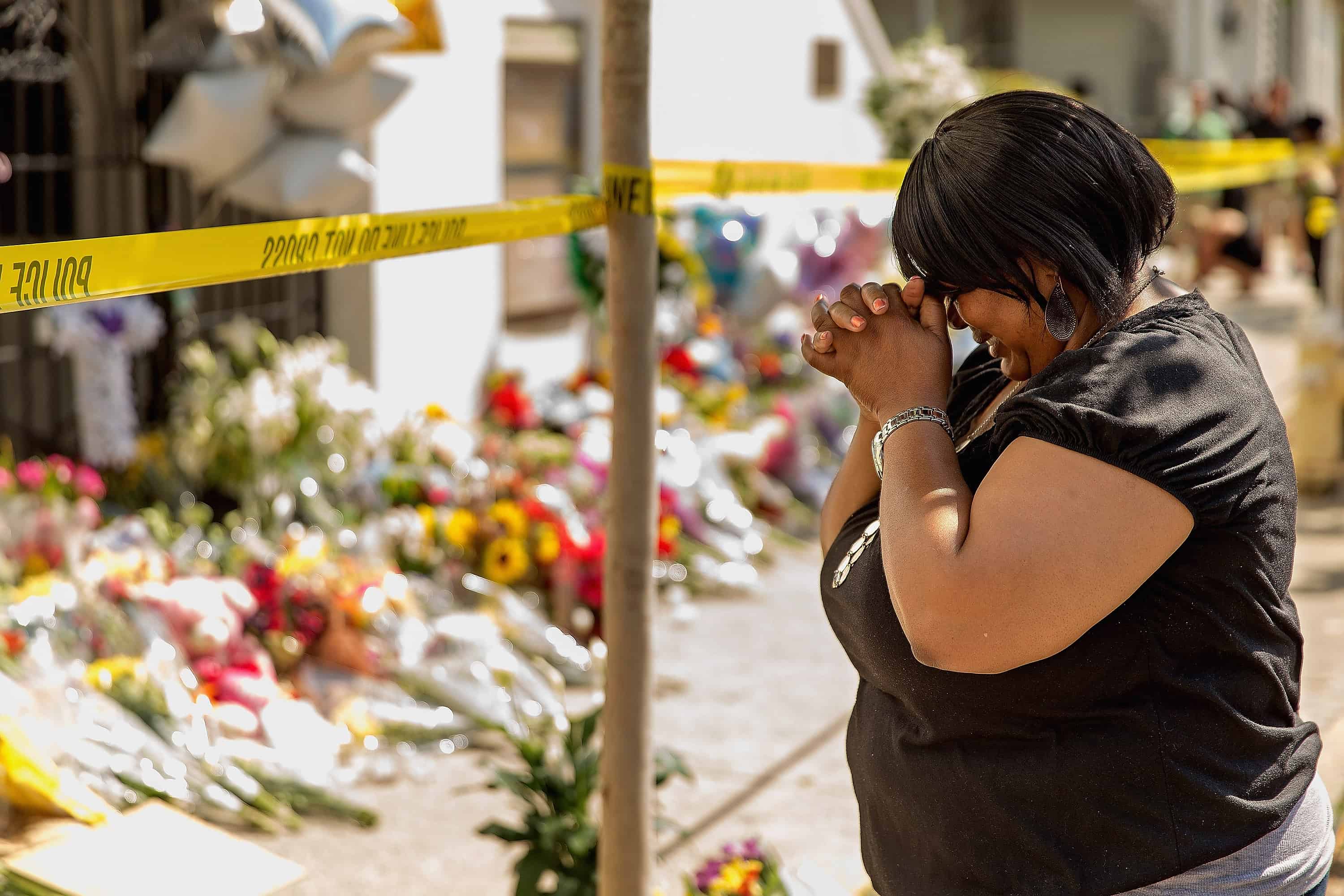 A woman weeps outside the historic Emanuel African Methodist Episcopal Church.