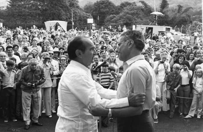 Costa Rican President José "Pepe" Figueres embraces U.S. Ambassador Viron Vlaky at the 1973 picnic.