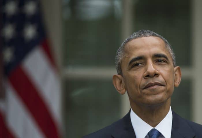 U.S. President Barack Obama pauses while delivering a statement on the Supreme Court ruling.