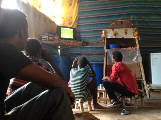 a group of Ethiopians in the Danakil area near the Eritrean border watch Costa Rica vs. Spain on June 11.