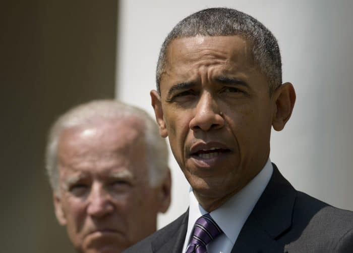 U.S. Vice President Joe Biden listens while President Barack Obama speaks in the Rose Garden.