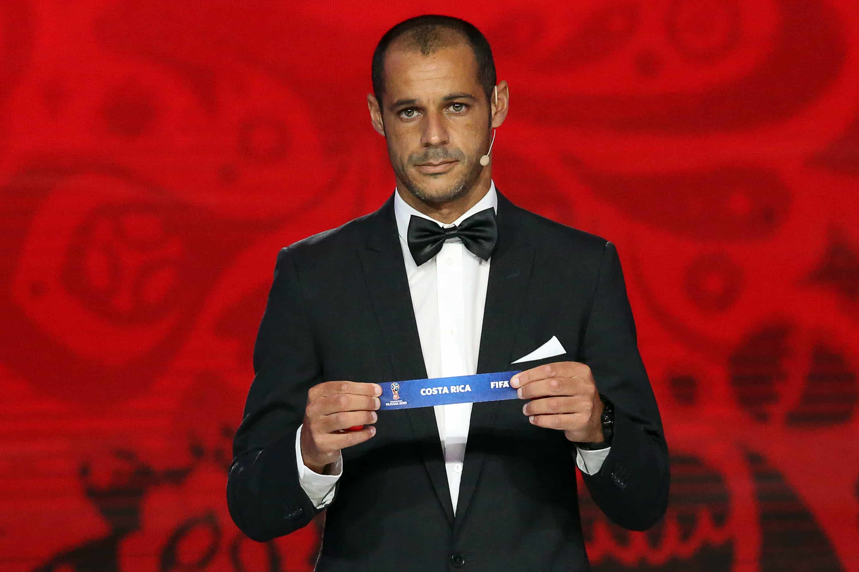 Portugal's beach soccer team forward and captain Madjer shows the name of Costa Rica during the preliminary draw for the Confederation of North, Central American and Caribbean Association Football.