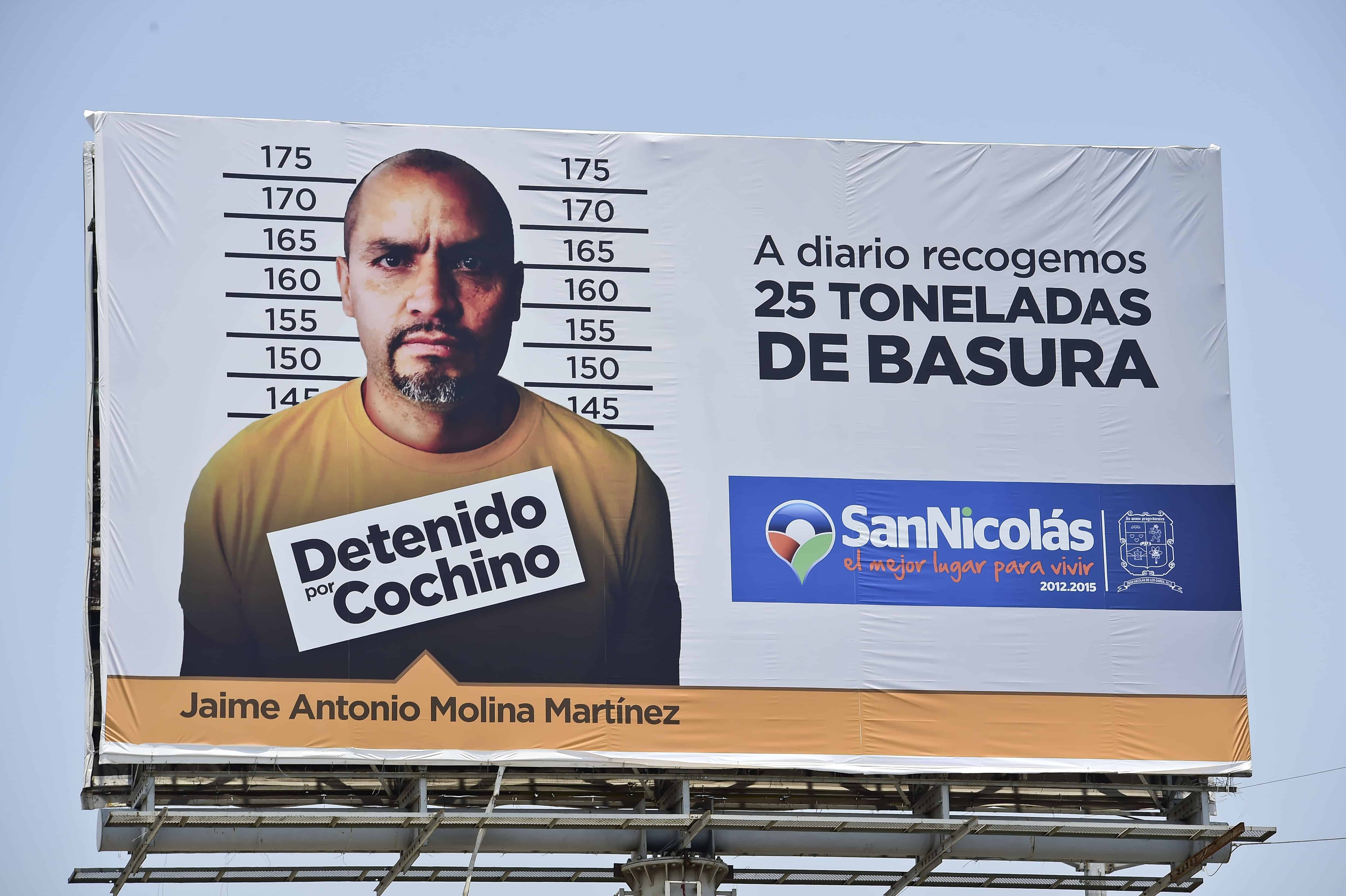 A billboard shows the mugshot of a man arrested for littering in Monterrey.