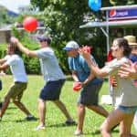 The water balloon toss had participants deep in concentration.
