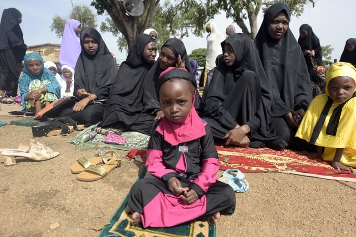 Muslim women and girls attend Eid al-Fitr prayers at the Isa Kazaure praying ground in Nigeria's central city of Jos.